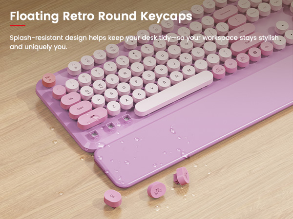 Floating round keycaps with a splash-resistant surface help keep spills and dust easy to wipe away.