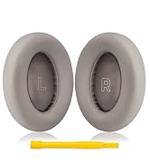 Pair of oval-shaped grey cushions or earpads, likely for headphones. Letters 'L' and 'R' visible inside, indicating left and right orientation. Yellow object partially shown below.
