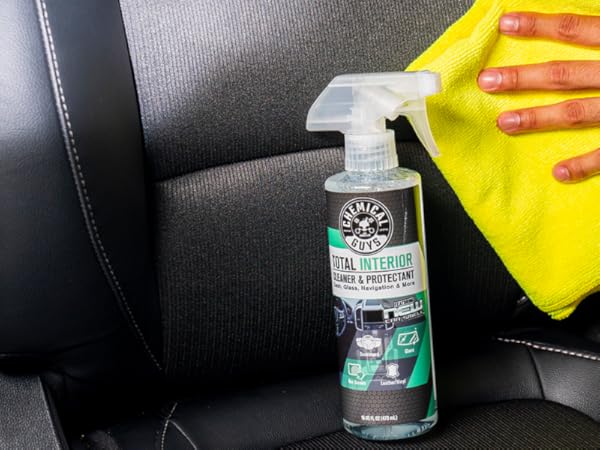 Detailing car carpet and fabric with Total Interior Cleaner & Protectant