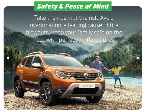 Portable car tire inflator with LED light being used during nighttime roadside emergency