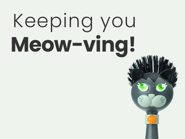 Delightful, soap-dispensing kitty-cat dish brush designed for everyday use.