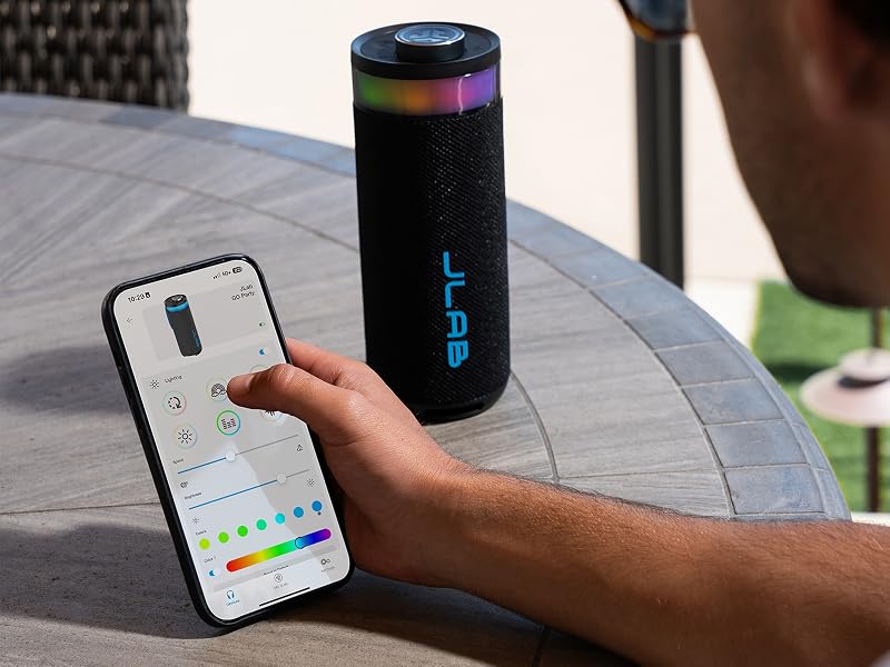 A person using the JLab app to adjust the RGB party light settings