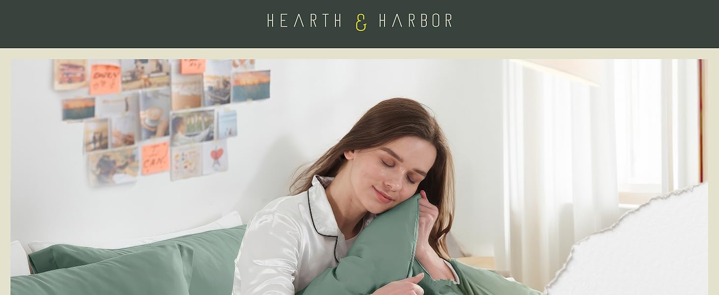 Woman holding duvet cover next to her face
