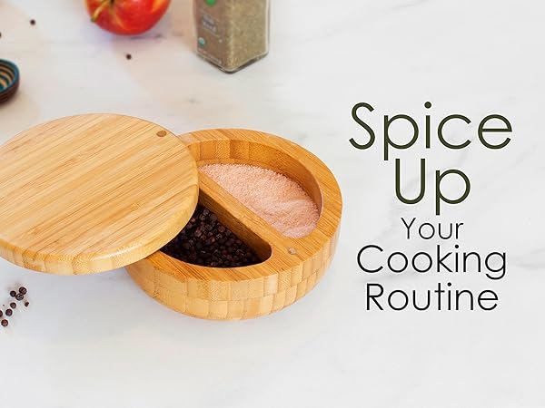 The Salt Keeper Duet with the swivel lid open on a marble kitchen counter.