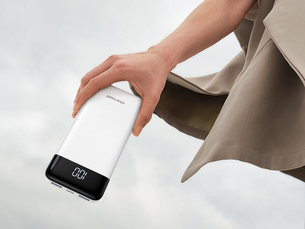 a hand holding a smart phone in a cloud