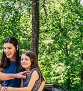 Family spending time together outside of their RV