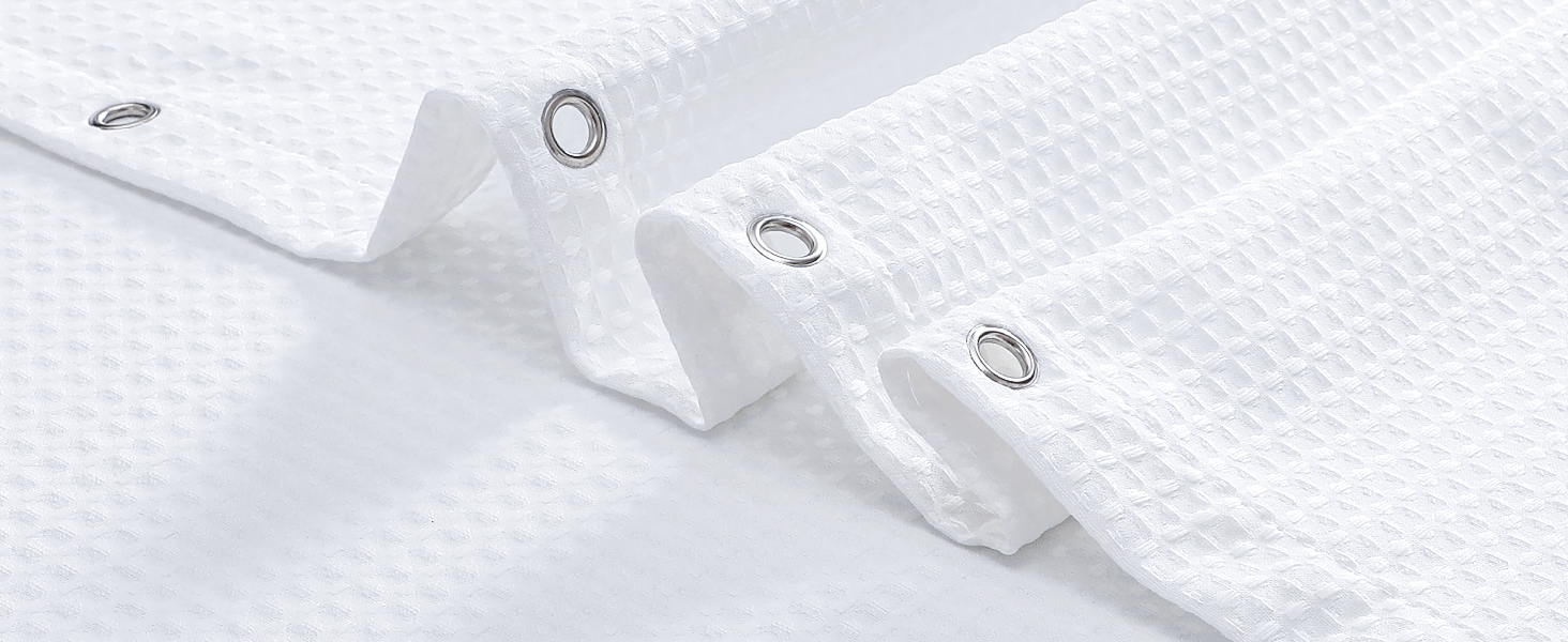 white cloth shower curtain