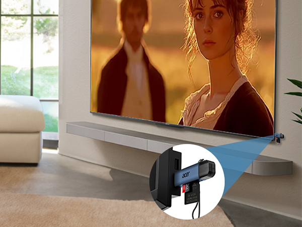 Television mounted on wall showing media content. Small inset image shows mounting bracket or hardware in corner.