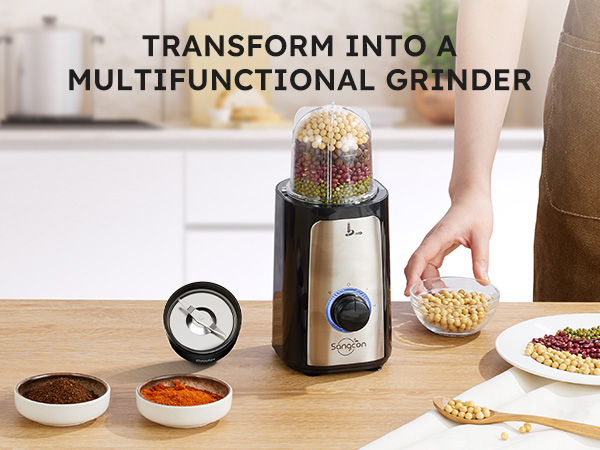 Multifunctional grinder with beans, spices, and grinding blade on a kitchen counter.
