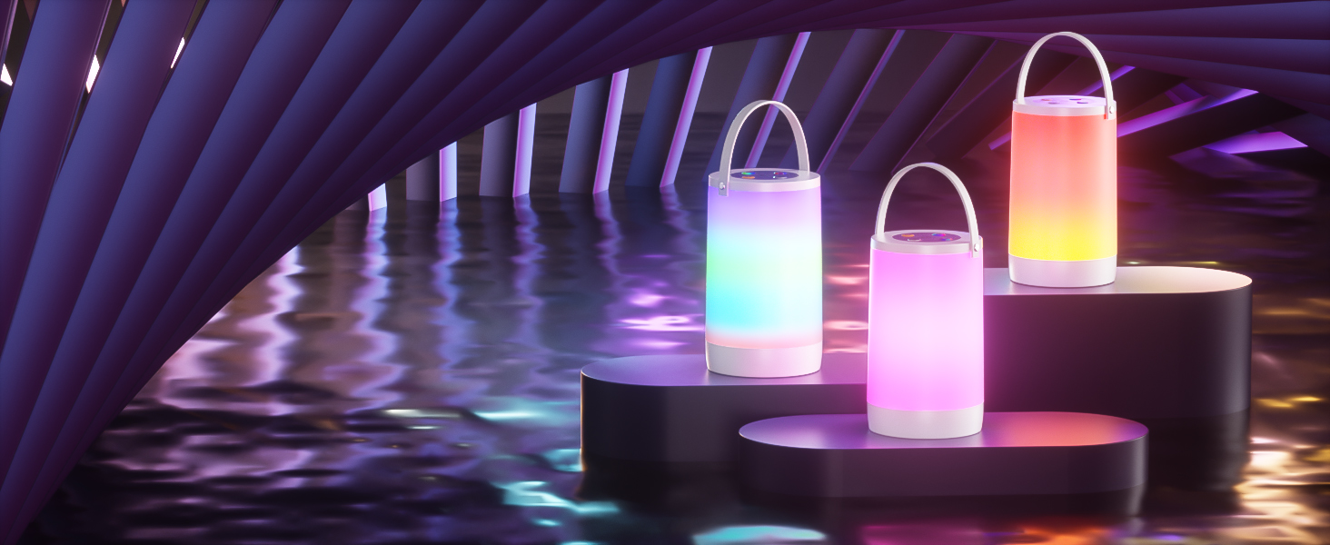Portable lanterns with color-changing LED lights. Three lanterns of different sizes displayed on reflective surface with purple ambient lighting.
