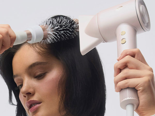 Drying hair with LuxeDry and brush