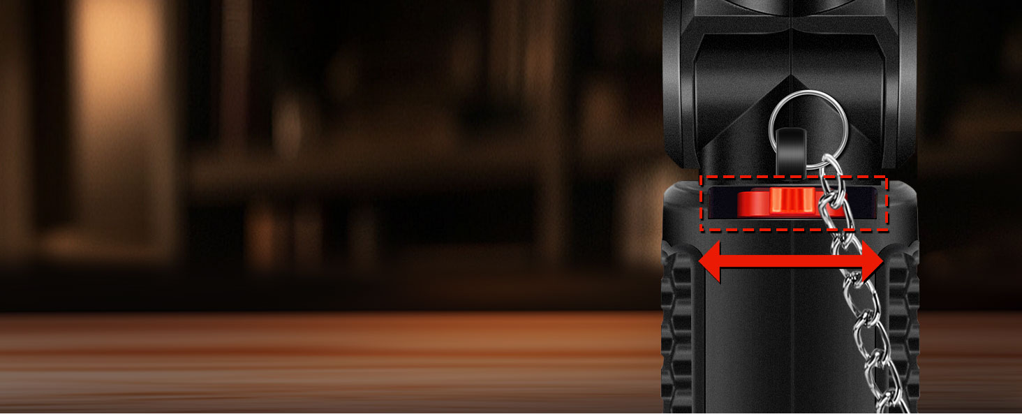Black cylindrical water bottle with red accent band. Features a carry handle, carabiner clip, and attached metal chain. Textured grip surface visible on bottle body.