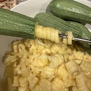 Customer photo of a zucchini with a hole in it