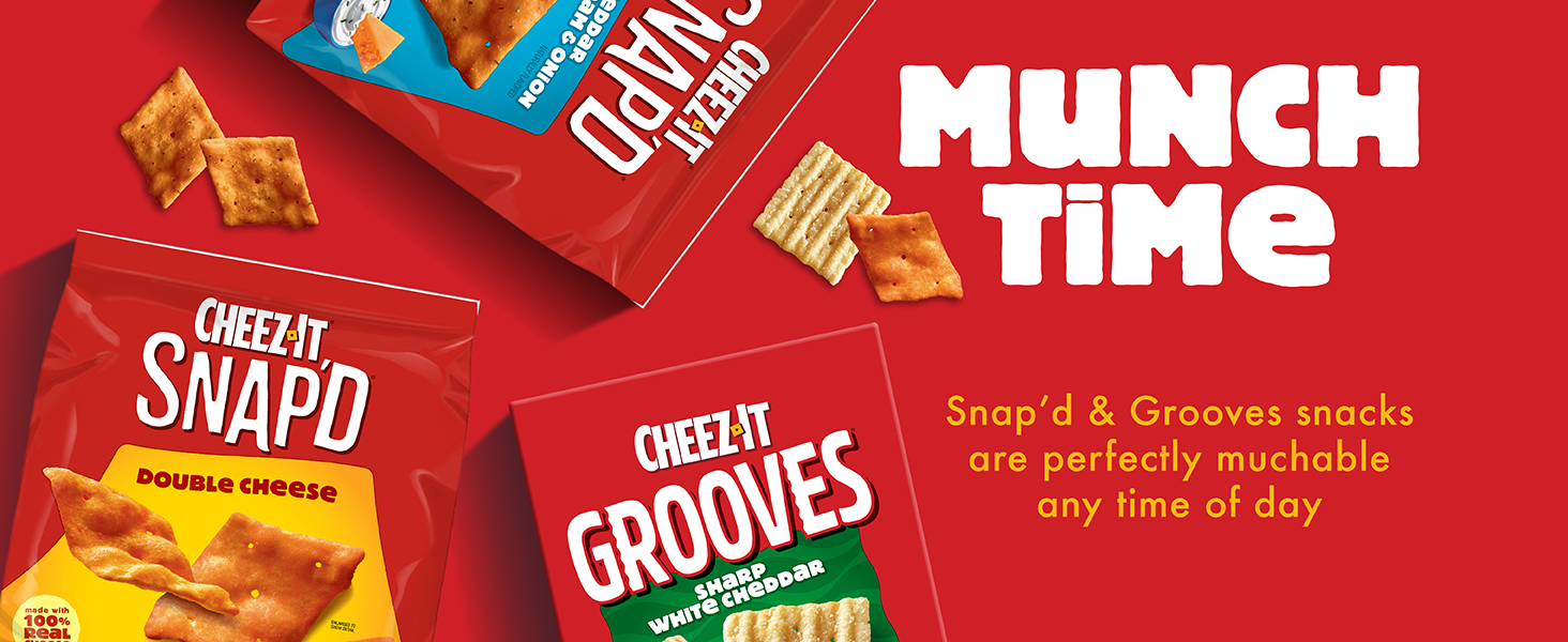 Overhead view of 3 packages of Cheez-It crackers in different flavors on red background, Munch Time