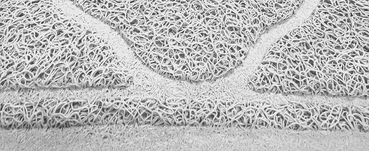 Detailed image of the coils and grooves on the grey litter mat