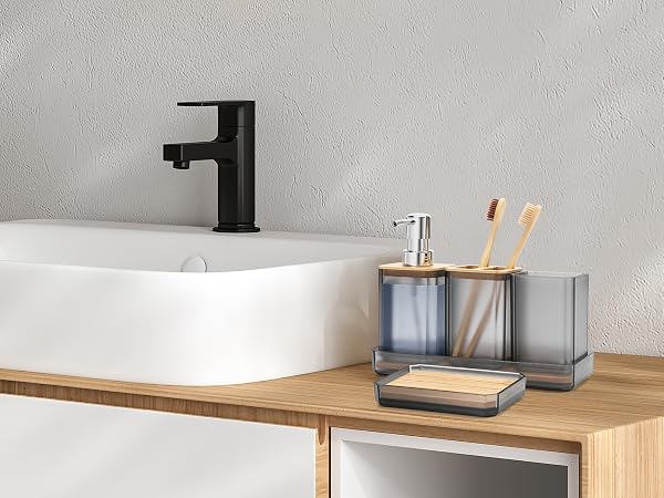 a bathroom sink with a black faucet and a black faucet.
