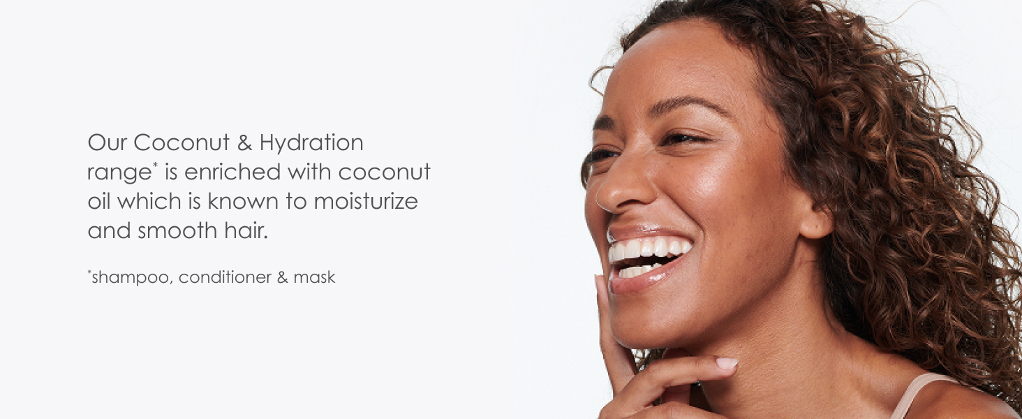Woman smiling with curly, healthy-looking hair next to text.