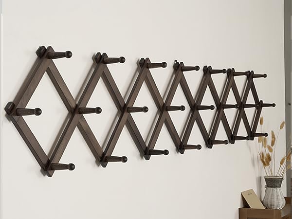 Vintage color diamond shaped wooden hanger on the wall