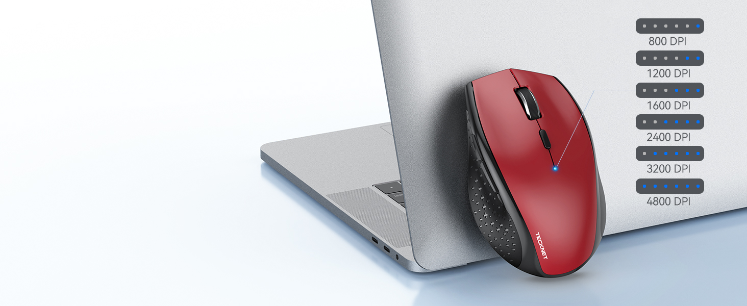 Red wireless computer mouse positioned next to a silver laptop, with interface menu showing multiple options displayed on the right side.