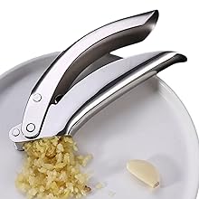 crusher , peeler Crush Garlic Fast with our Stainless Steel Garlic Press
