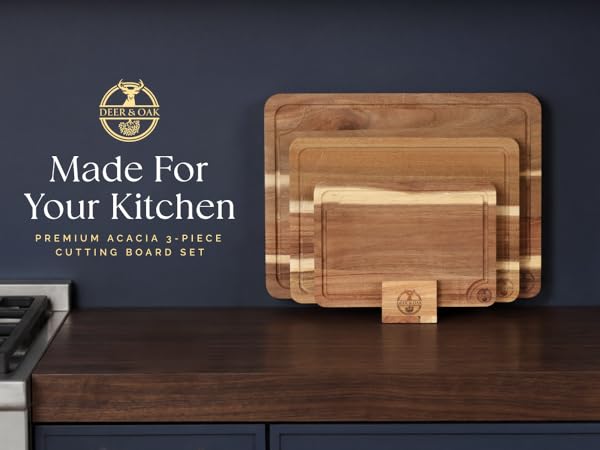 Acacia Cuttiing Board 3 piece set displayed on kitchen counter