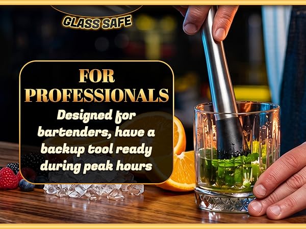 Bartender muddling mint for cocktail at bar