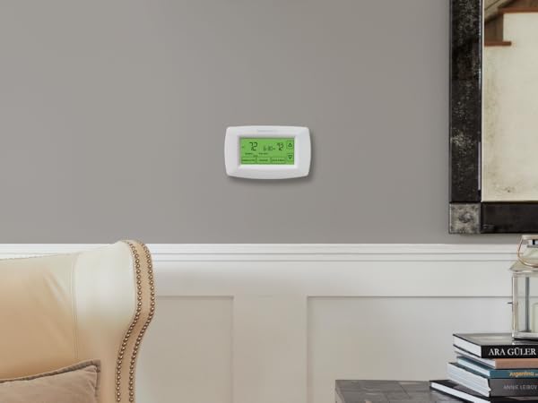 Thermostat installed on wall in a home