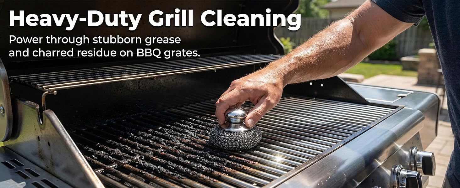 Stainless steel scouring pad with handle removing grease from BBQ grill grates