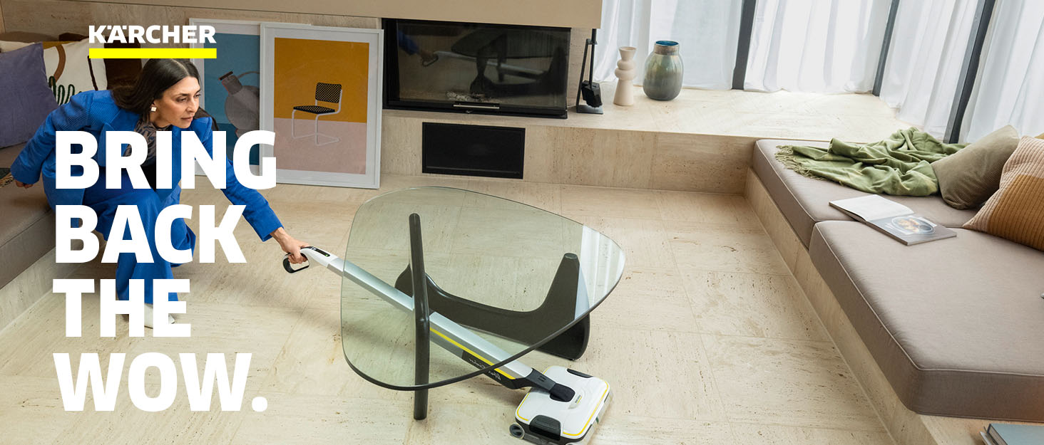 Lady cleans living room with a Kärcher FC 7 Floor Cleaner