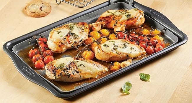Rachael Ray baking sheet with roasted chick and tomatoes, cooling cookies