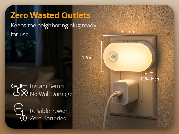 Compact plug-in night light leaving second outlet free.