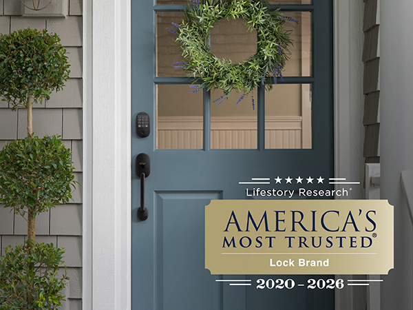 Schlage smart lock and door handle grip on front door of home voted America's Most Trusted