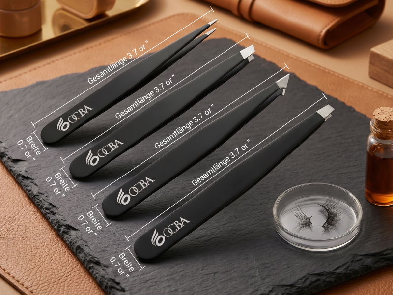 Four black eyebrow makeup brushes with white ferrules arranged on gray fabric with makeup container. Professional cosmetic brush set displayed on wooden surface.
