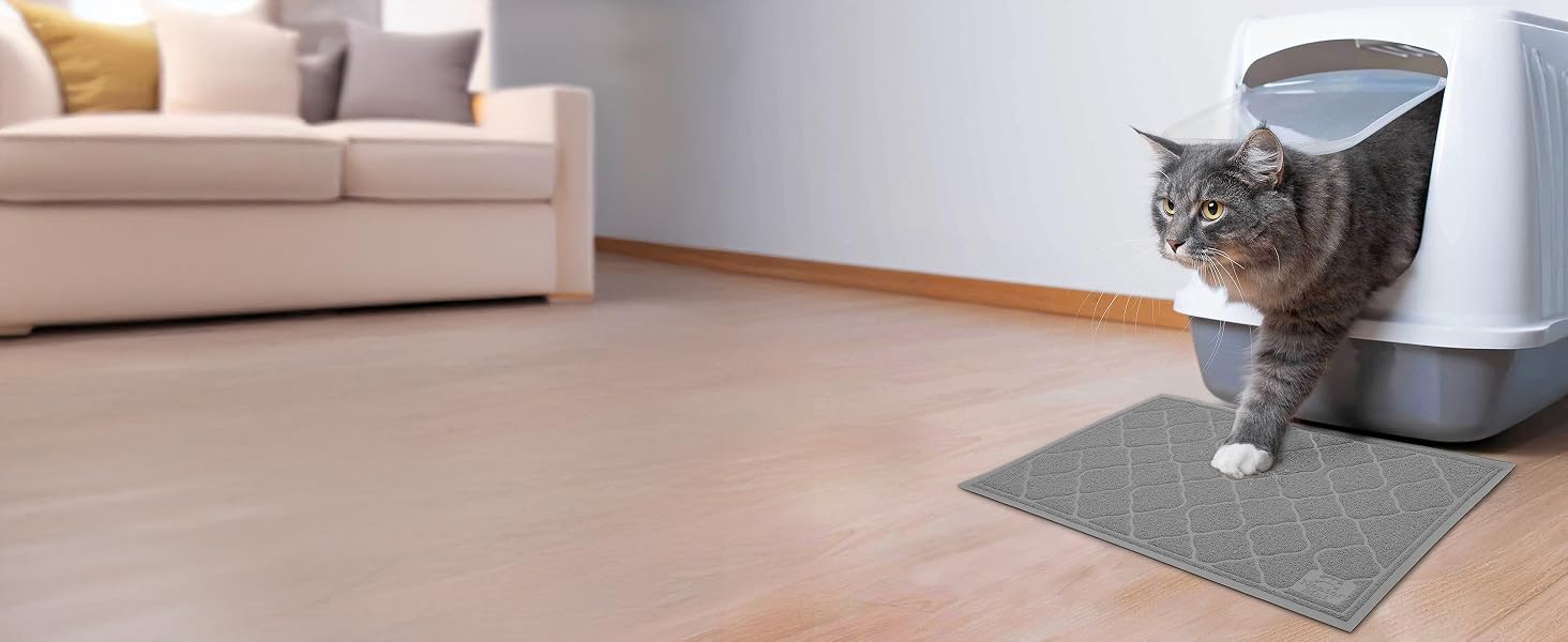 Cat stepping onto the Neater Mat Litter Trapping Mat in Grey