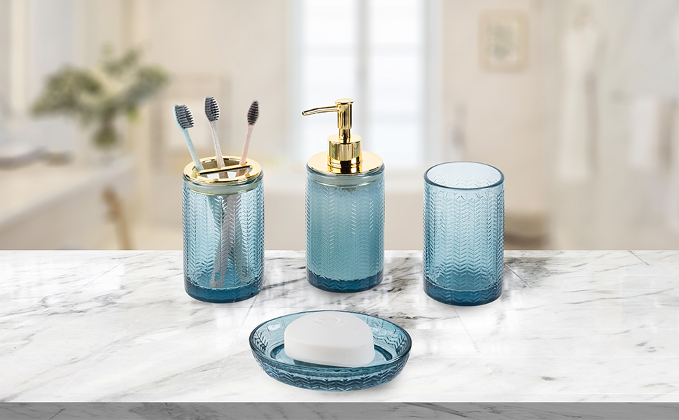 4 piece bathroom accessories set with transparent blue glass finish and brass accents