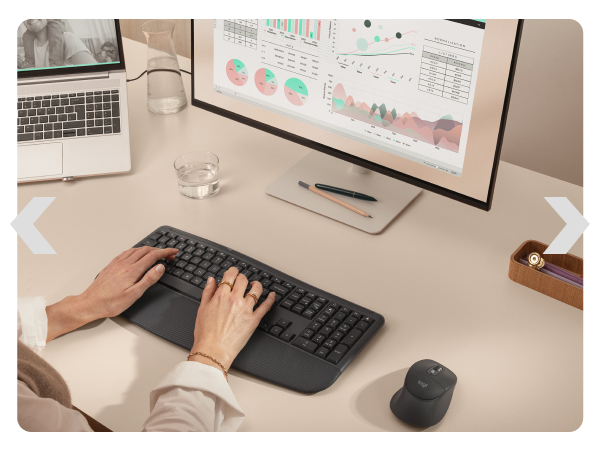 a woman typing on a keyboard