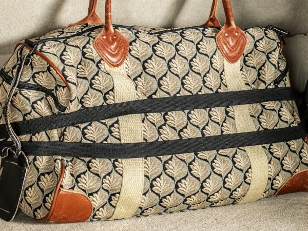 High Road HoldTight Car Strap in the trunk with luggage in it