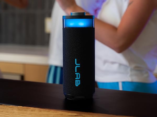 Go speaker with party lights illuminating