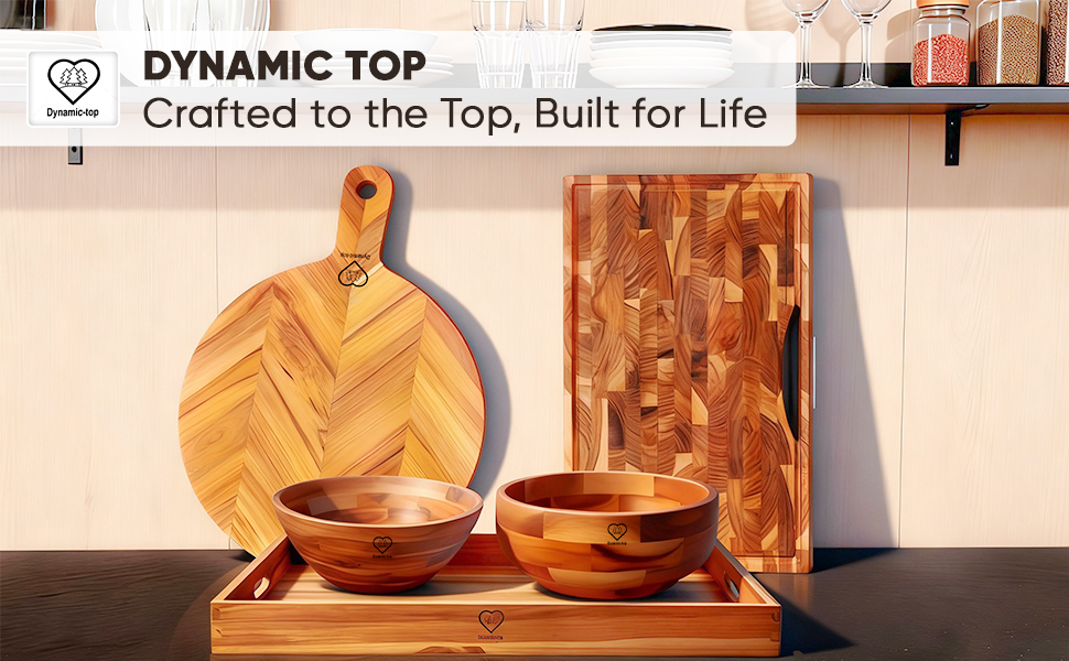 Natural wood cutting boards, serving tray, salad bowls displayed as kitchen essentials