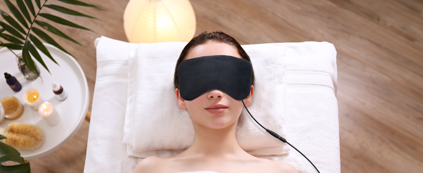 Heated eye mask