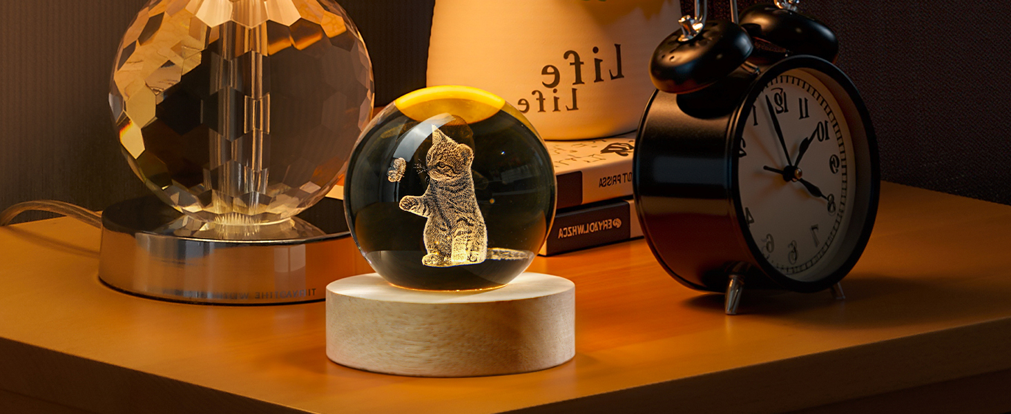 2.3IN CRYSTAL BALL FIGURINES