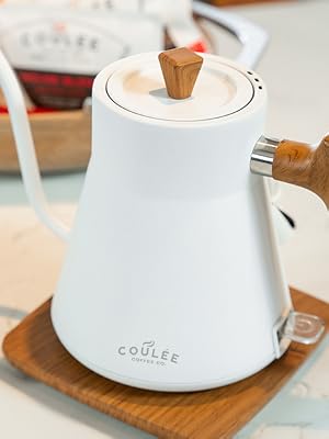 White Kettle Looking down from top you can see the wood details on the top, handle and base.
