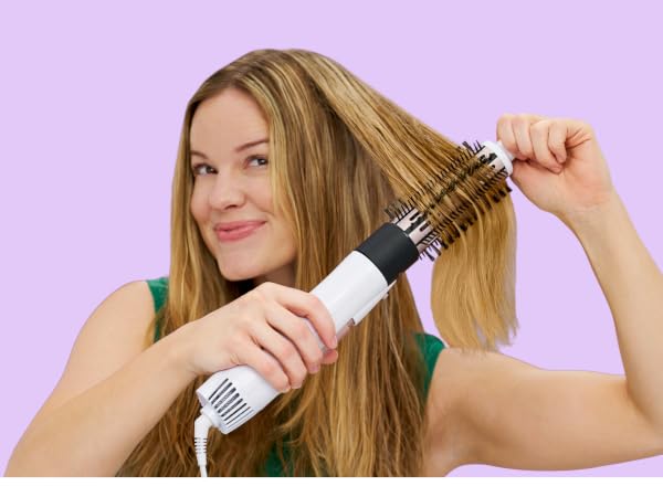 Woman using air brush