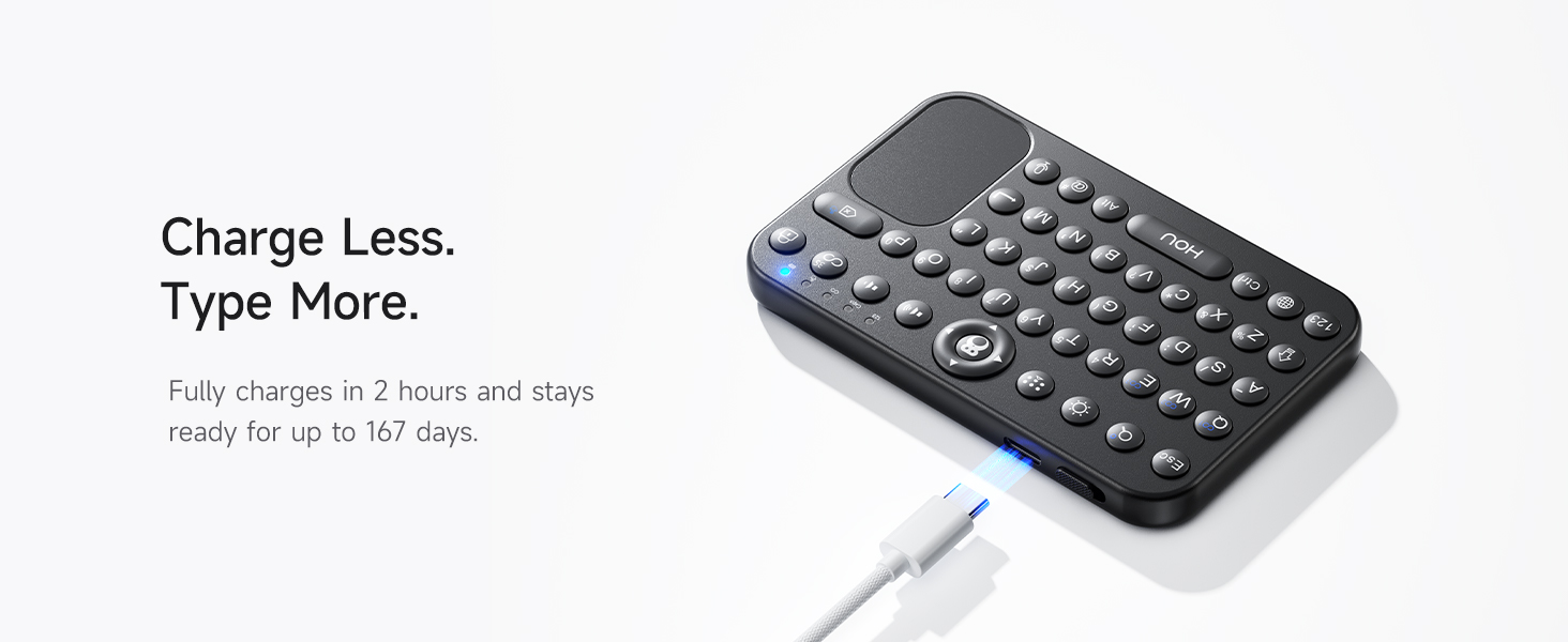 Silver mini keyboard being charged with Type-C cable showing long standby battery feature