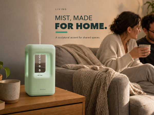 WINBEN green cool mist humidifier running on a side table in a contemporary living room
