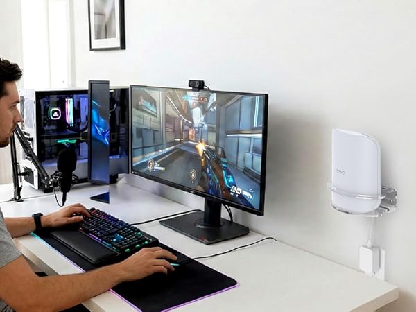 Multiple views of gaming setup featuring desktop computers, monitors, and gaming peripherals in home office environment.