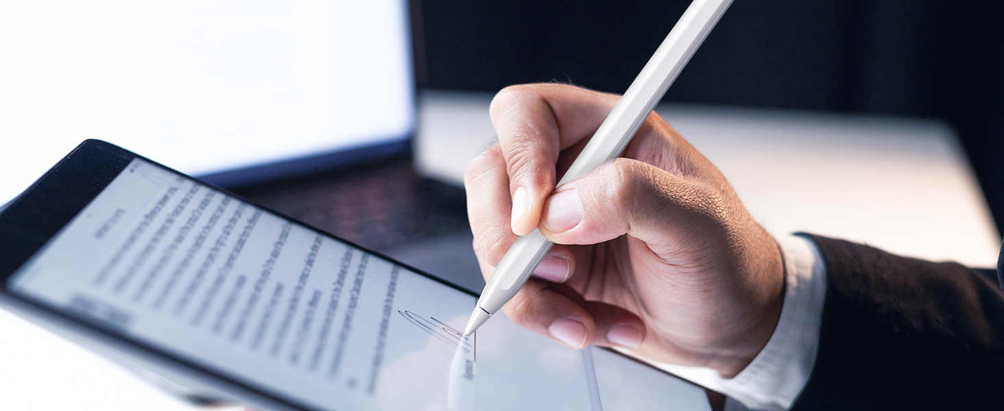 a person using a pen on a tablet