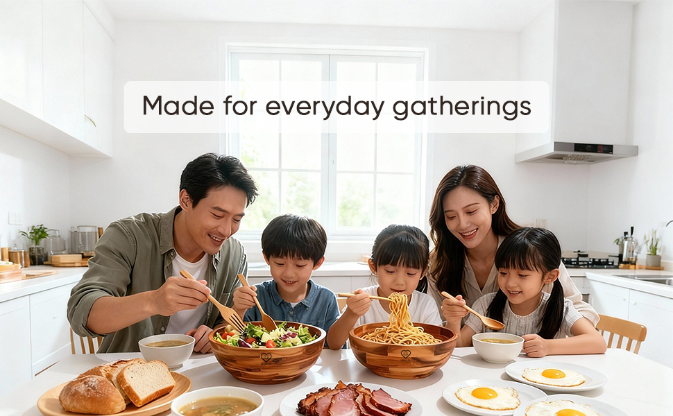 Natural wood cutting boards, serving tray, salad bowls displayed as kitchen essentials