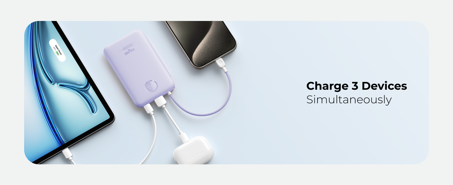 Portable power bank charging multiple devices simultaneously