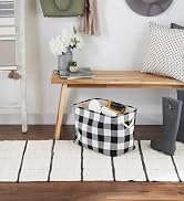 buffalo check printed storage bin styled in an entry way